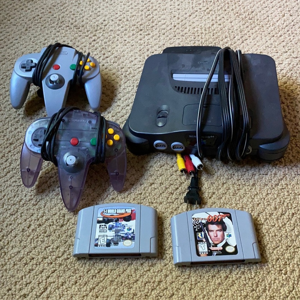 Nintendo 64 with 2 controllers and 2 games. Works well!